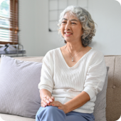Woman sitting on couch