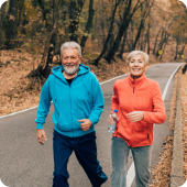 Two people walking outdoors